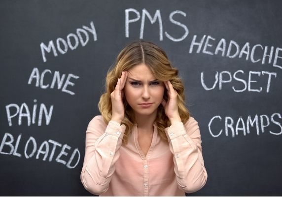 female experiencing hormonal imbalance | how to treat hormonal imbalance | Perpetual Wellbeing