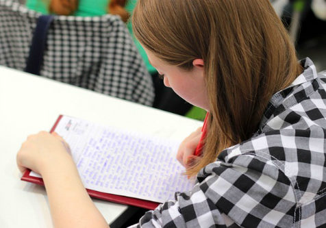 Student in exam | Effects of Unhealthy Eating on Academic Performance | Brisbane Nutritionist | Perpetual Wellbeing