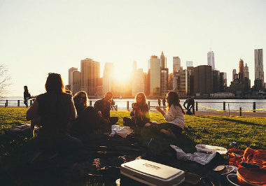 picnic with friends on the grass | living with allergies | Perpetual Wellbeing